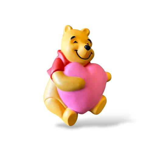 Disney Parks Plastic Winnie The Pooh Holding a Heart pin